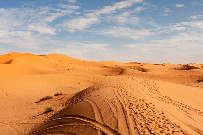 2 Days Sahara Group Tour Fez to Marrakech via Merzouga - Riding into the Erg Chebbi dunes