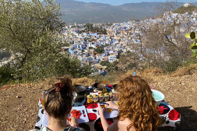 3-Hour Cooking Class overlooking the Blue City - Cooking over the fire with Chefchaouen below