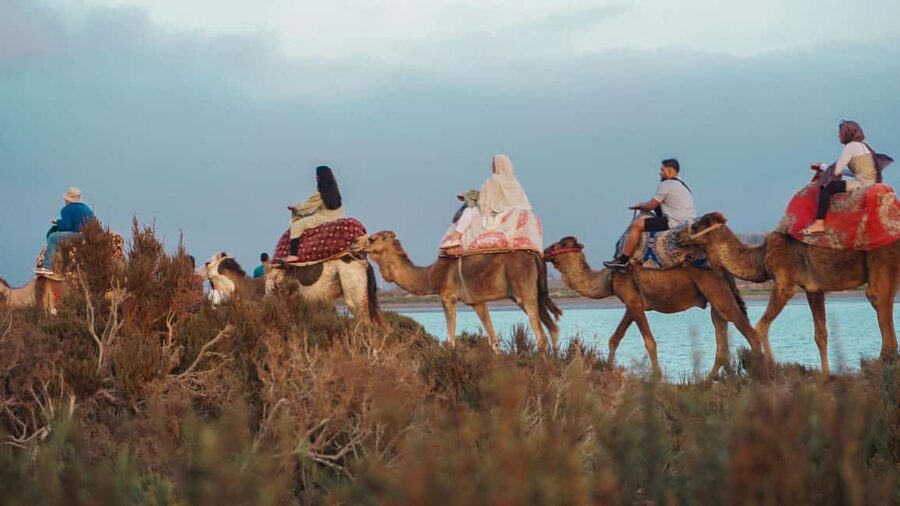 Agadir: Camel Riding Tour with Tea Drink - Getting settled on the camel