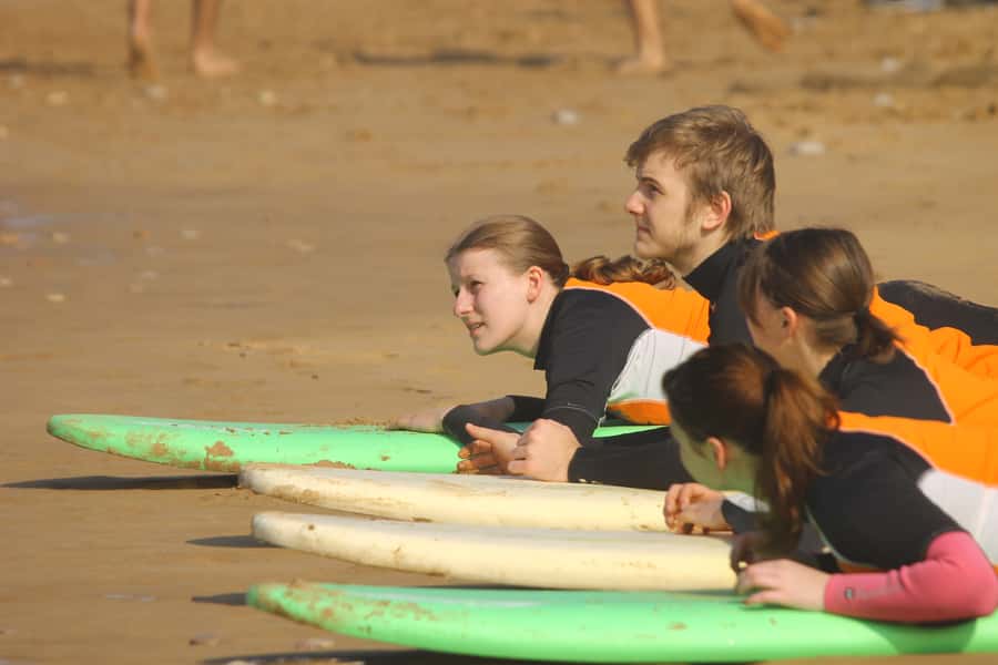 Agadir: Taghazout Beach Surf Lesson with Lunch and Transfer - Lunch beneath the beach umbrellas