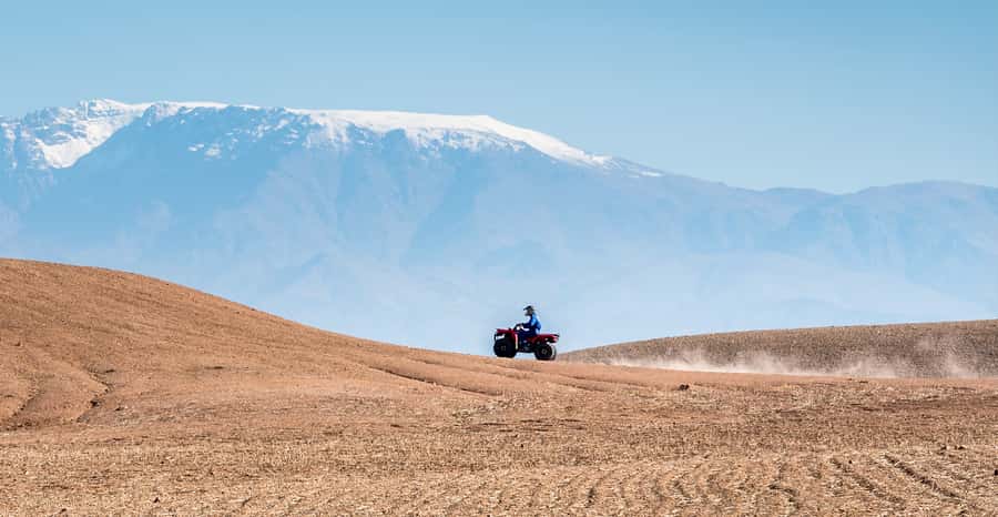 Agafay Desert: Quad Bike and Camel Ride Adventure Tour - The camel ride through rocky hills and villages