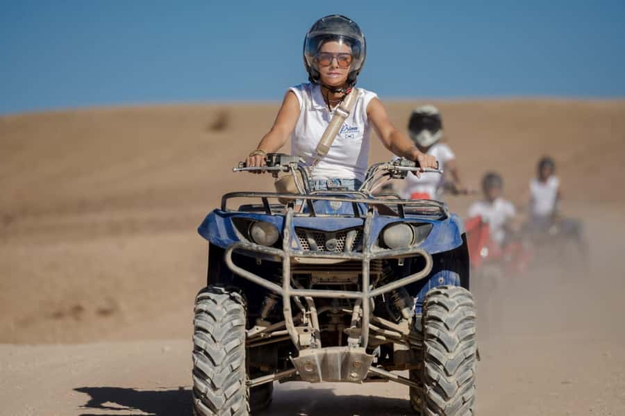 Agafay Desert Tour: Quad, Camel, Lunch & Pool Access - Guides, Language, and Transport