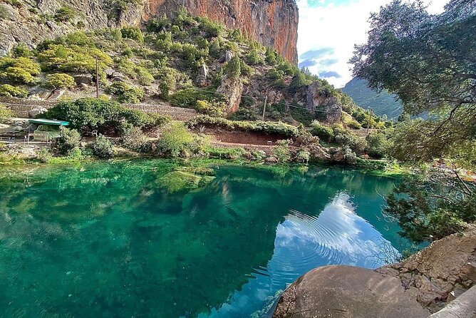Akchour waterfalls tours - Walking beside water and rock