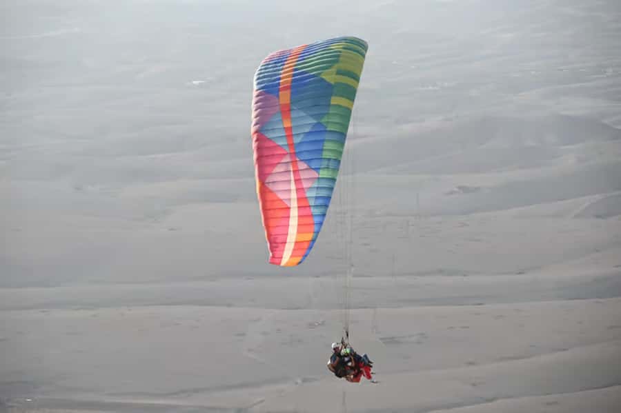 Atlas Paragliding & Agafay Desert Adventure from Marrakech - Taking off over the Atlas foothills