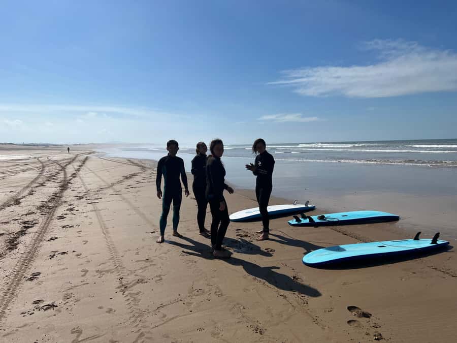 Beginners friendly surf in nice spots - The Instructors: Adam, Momo, Simo, and Simone