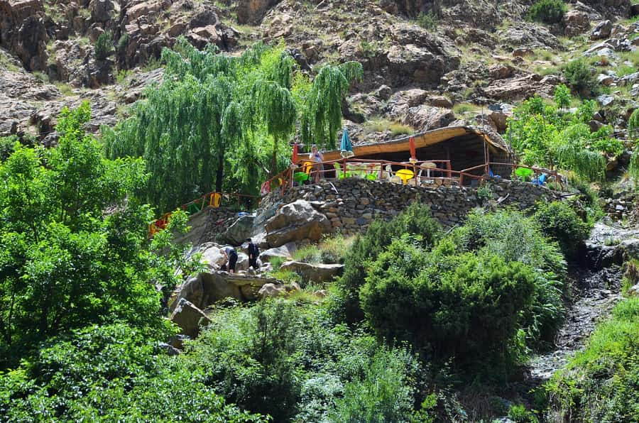 Day Trip To Ouzoud Waterfalls & Boat Ride From Marrakech - The wooden boat and the best view of the spray