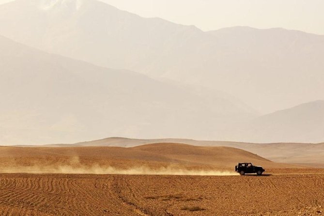 Dinner Show in Agafay Desert with Quad Bike & Camels - Music, dancing, and the fire show