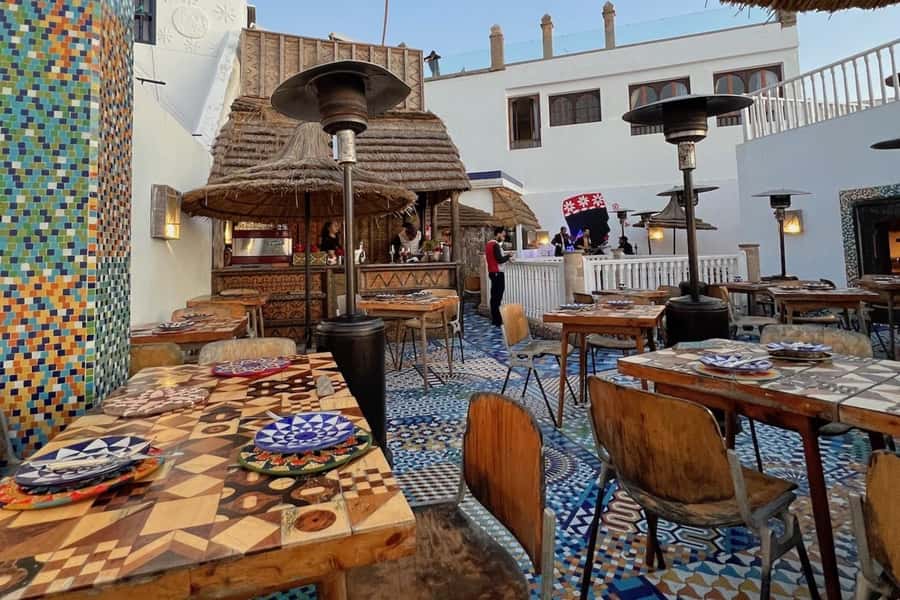 Explore Essaouira's Secrets: A Guided Tour with a Local! - Moulay Hassan Square and the harbor walls