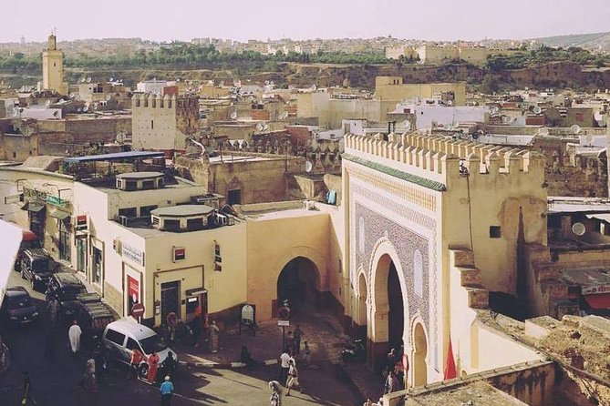 Fes Guided Sightseeing Tour with Luxury Car All Inclusive Tickets - Walking through the old Medina