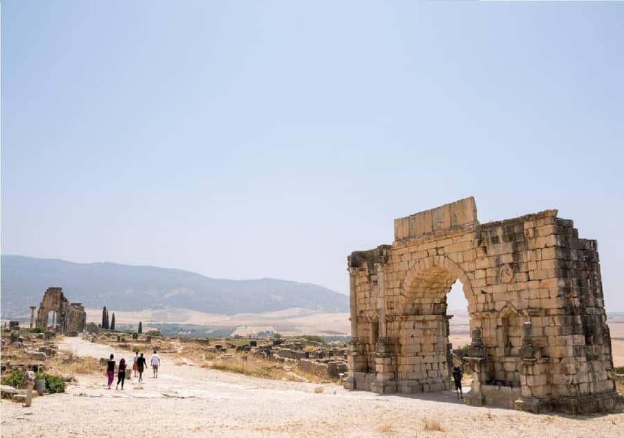 From Fez: Volubilis, Moulay Idriss and Meknes Full Day Tour - Seeing sacred Moulay Idriss from the town lanes