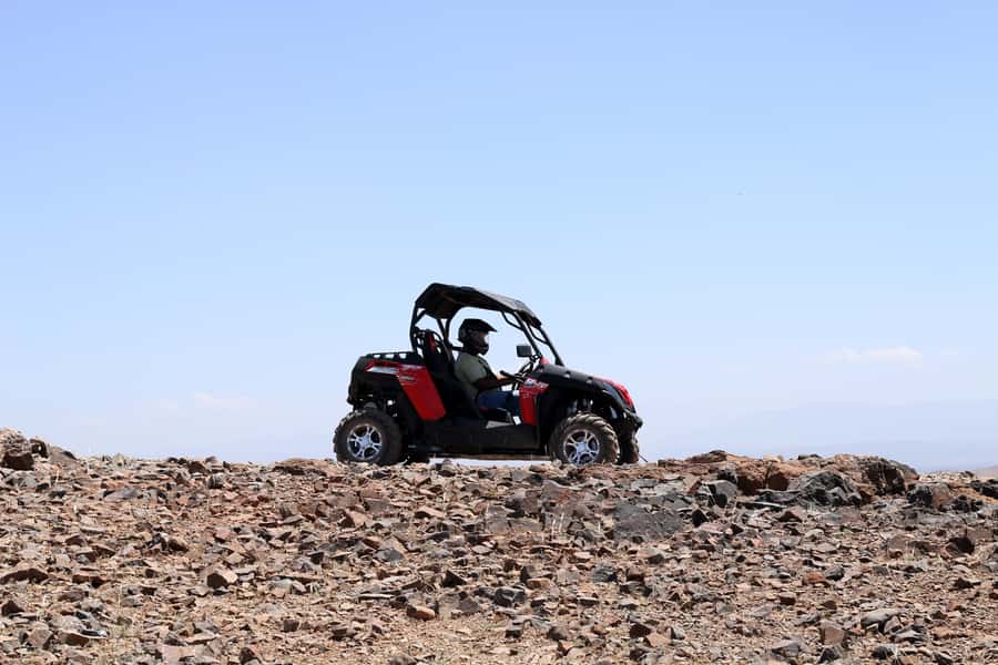 From Marakkesh: Half Day Buggy Adventure in Agafay Desert - Desert tracks, Berber villages, and mountain views