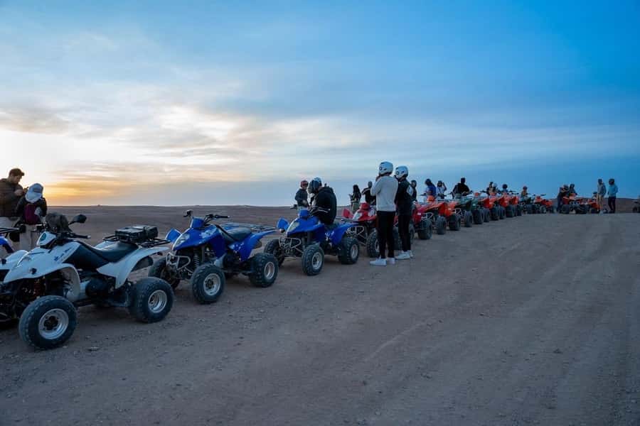 From Marrakech: Agafay Desert Quad Biking with Dinner & Show - Dinner under the tent, with tagine at the center