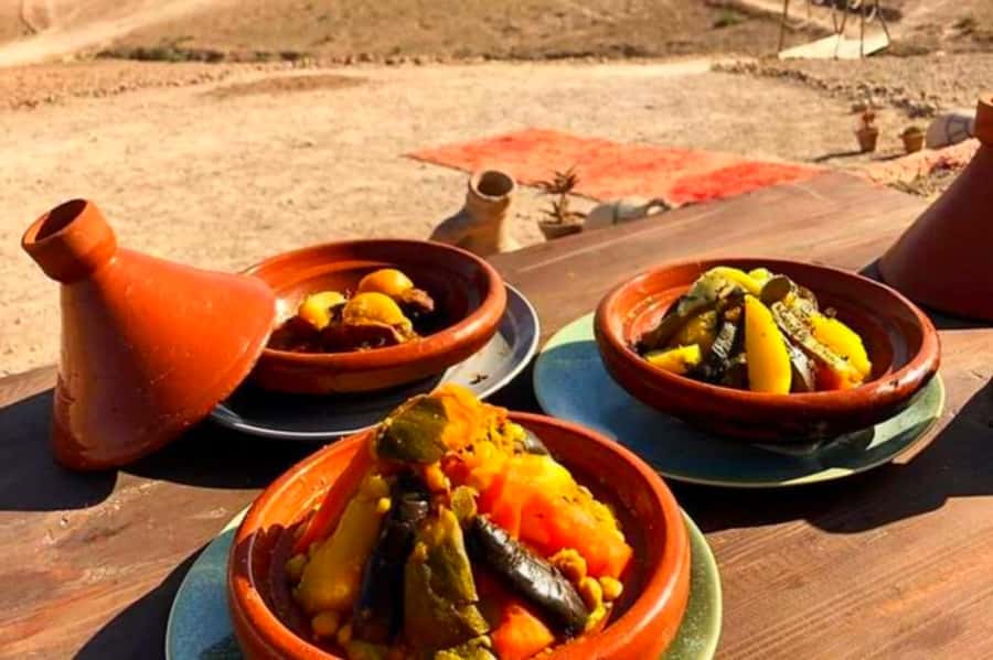 From Marrakech: Agafay Desert Sunset Dinner with Live Show - Seeing how Moroccan argan oil is made