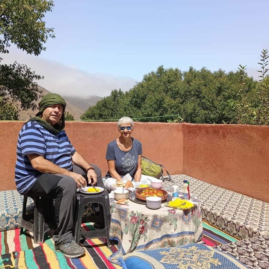 From Marrakech: Atlas Mountains Summit Trek - Reaching Isk and eating above the valley