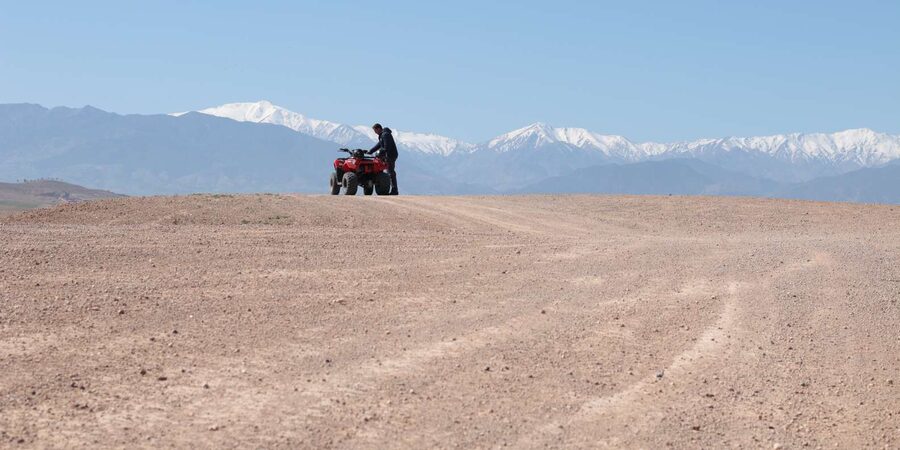 From Marrakech: Guided Quad Biking Tour in Agafay Desert - Safety, clothing, and who should book