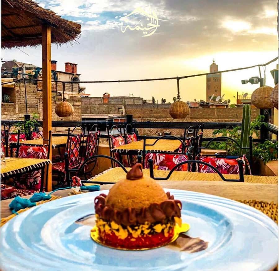 From Marrakech: Rooftop Dinner & Romantic Medina Views - A rooftop view over Marrakech’s old city