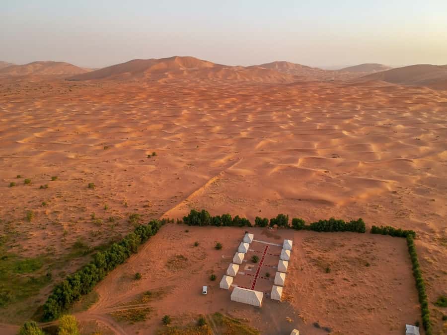 From Merzouga: Desert Overnight in Heated Tent & Camel Ride - Mint tea, private tents, and a surprisingly comfortable night