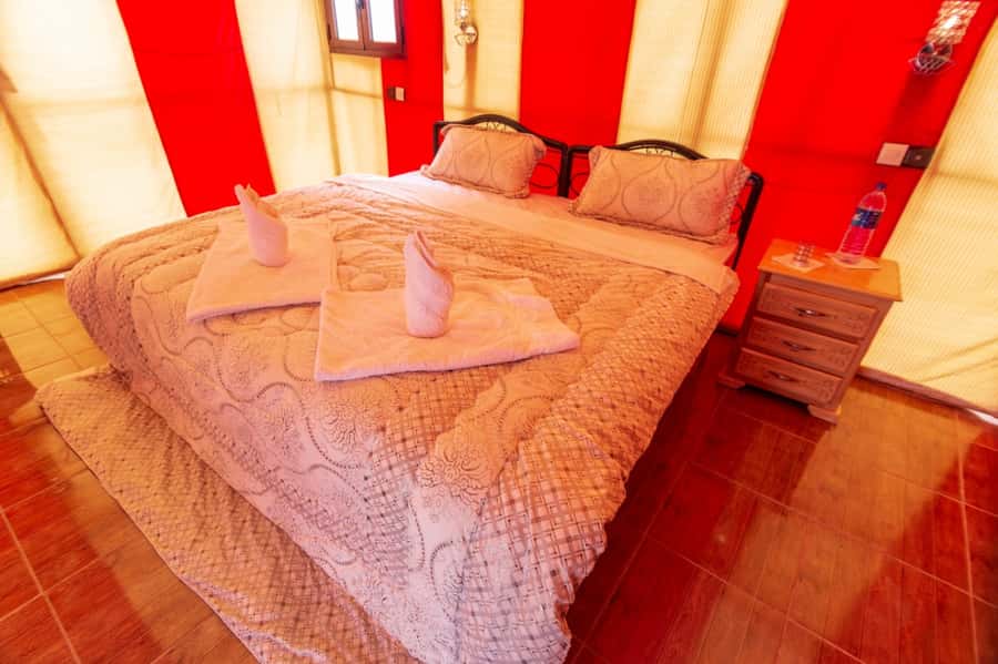From Merzouga: Desert Overnight in Heated Tent & Camel Ride - Drums, singing, and a night under the stars