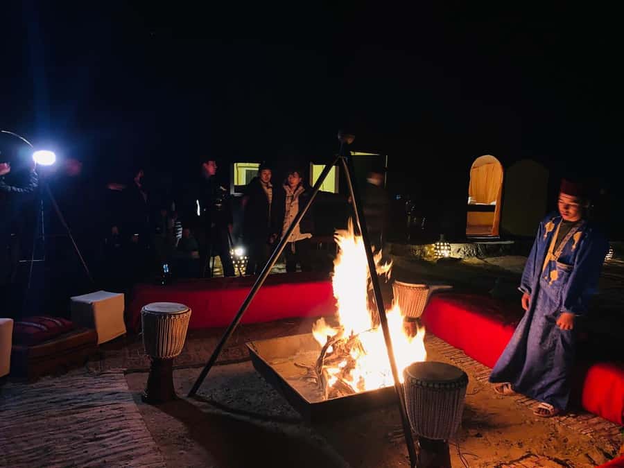 From Zagora: Overnight Desert Tour to Erg Chigaga Camel ride - A private tent, Moroccan dinner, and music by the fire