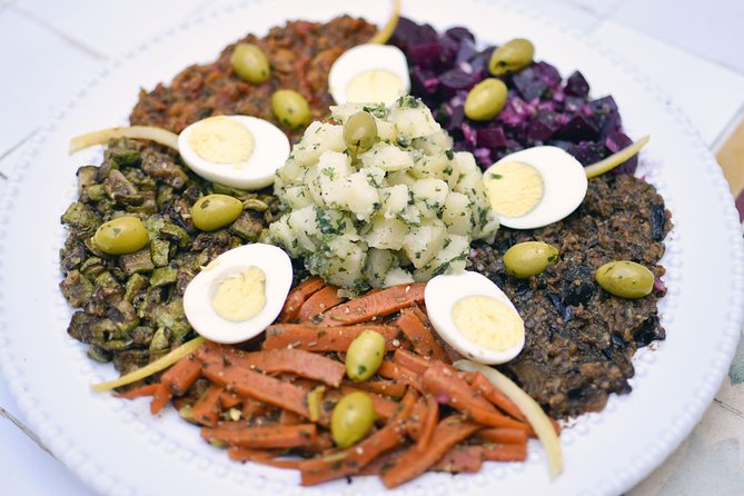 Market Tour & Moroccan Cooking Class in Casablanca with Transfers - Sitting down to the meal you helped prepare