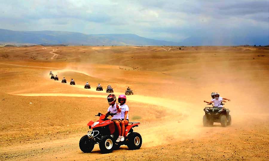 Marrakech Adventure: Agafay Desert Quad, Camel, Lunch - Pickup From Marrakech and the Ride Out