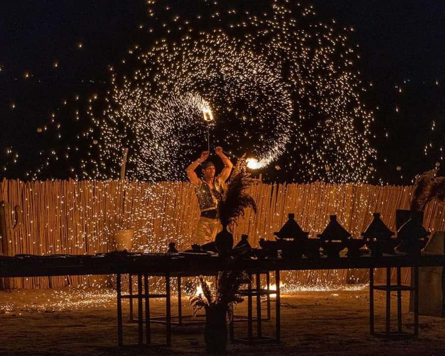 Marrakech: Agafay Desert Camel Rides, Dinner and Fire Show - Agafay is a rocky desert, not a sea of Sahara dunes