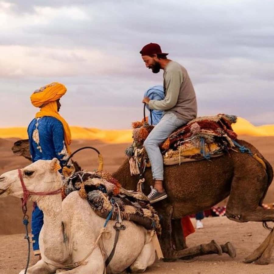Marrakech: Agafay Desert Dinner Show with Sunset Camel Ride - Arriving at the Agafay Desert camp