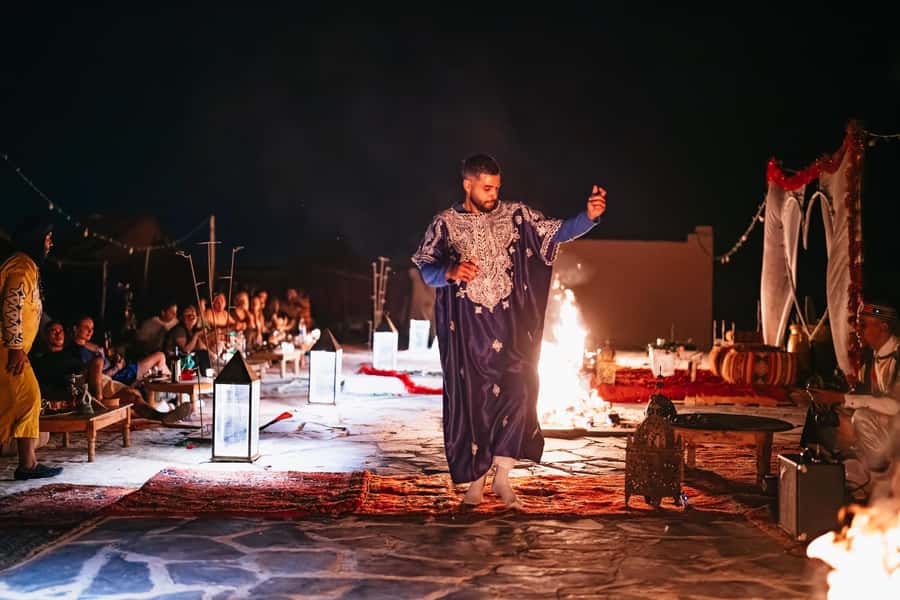 Marrakech: Agafay Desert Pool, Dinner & Live Show Experience - Sunset from a small desert hill