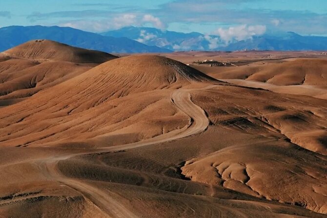 Marrakech: Agafay Desert Sunset, Camel Ride, and Dinner Show - Berber music and the fire show