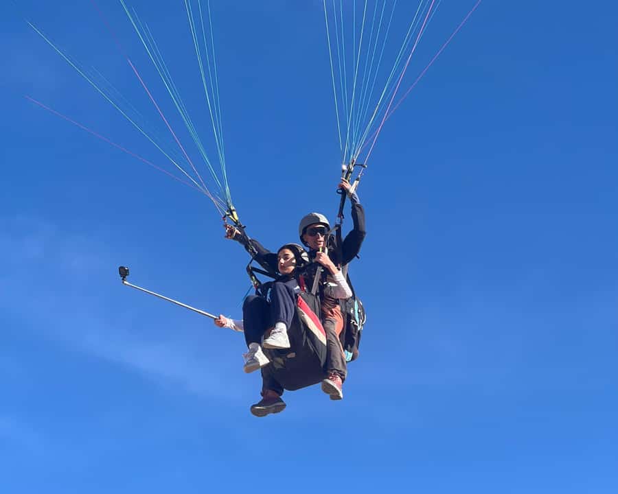 Marrakech: Atlas Mountains Paragliding Tour with Video - Preparing for takeoff in the Atlas foothills