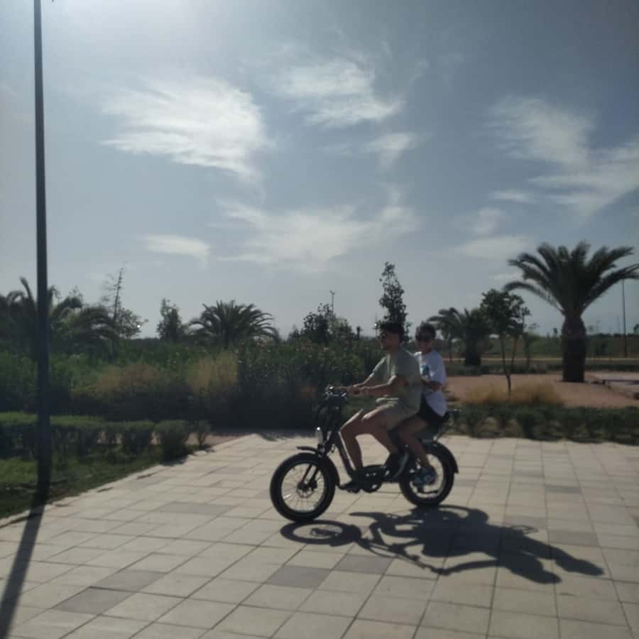 Marrakech: Bicycle Tour with a Local Guide - Traffic, helmets, clothing, and weather