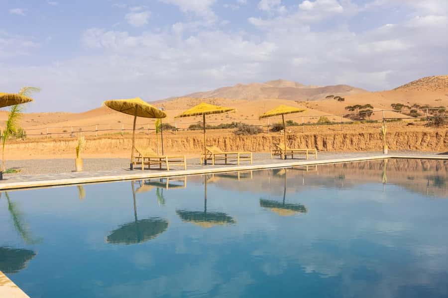 Marrakech: Day Pass in The Desert, swimming pool and lunch - Camel rides and other optional activities