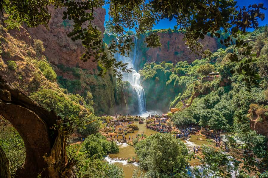 Marrakech: Day Tour to Ouzoud Waterfalls with Boat Trip - The small boat beneath the falls