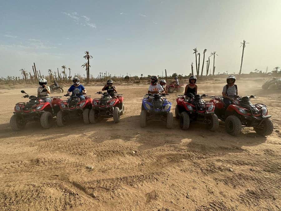 Marrakech: Desert and Palm Grove Sunset Quad Tour with Tea - Mint tea, bread, and a quiet local stop
