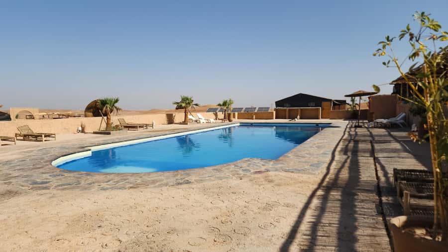 Marrakech Desert Sunset: Quad Biking, Dinner & Fire Show - Cooling off at the desert camp