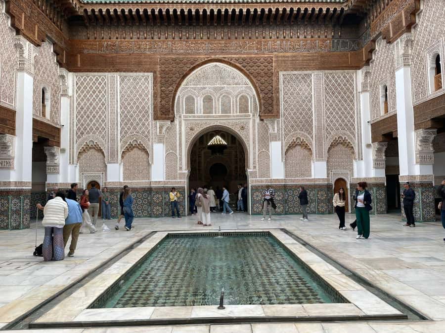 Marrakech: Madrasa Ben Youssef, Secret Garden & Medina Tour - Starting at Jemaa el-Fna with a local guide