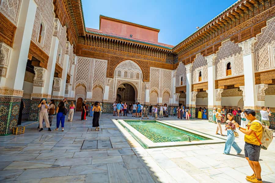 Marrakech: Madrasa Ben Youssef, Secret Garden & Medina Tour - What guide quality adds to the experience