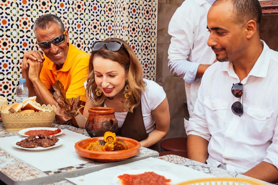 Marrakech: Private Food Tour – 10 Tastings with Locals - Walking through the Mellah market
