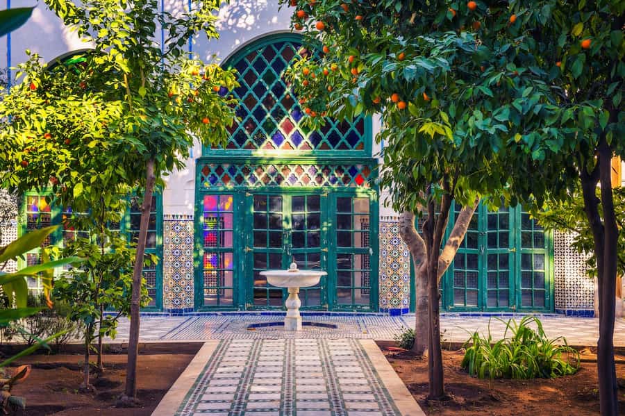 Marrakech: Private Full-Day City Tour w/ Majorelle Garden - Bahia Palace, tilework, and shaded courtyards