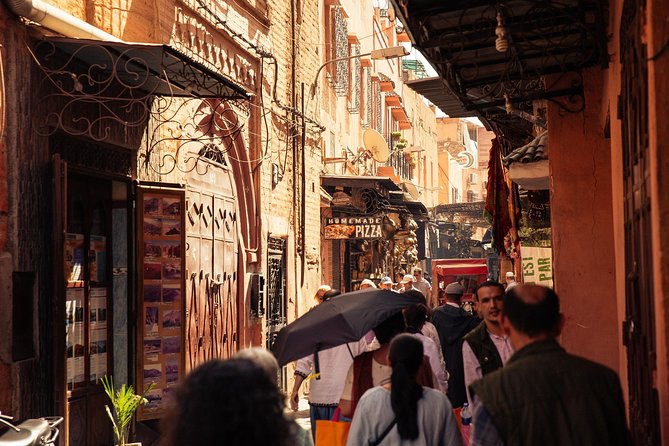 Marrakech PRIVATE TOUR With Locals: Highlights & Hidden Gems - Mellah, spices, sweets, and warm bread