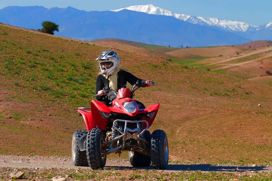 Marrakech: Quad Bike and Camel Ride Tour - The camel stop and Moroccan clothing