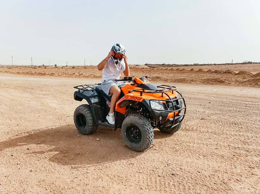 Marrakech: Quad Bike Tour to Palm Oasis and Jbilat Desert - Riding through palms, villages, and rocky desert