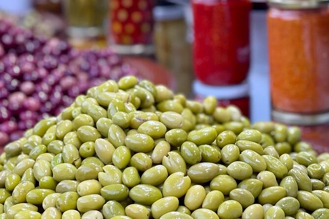 Marrakech: Street Food Tour by Night - Side streets, olives, dates, and local snacks
