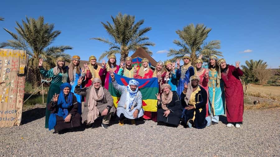 Marrakech to Fes: 3-Day Merzouga Desert Camel & Sandboarding - Walking beneath the cliffs of Todra Gorge