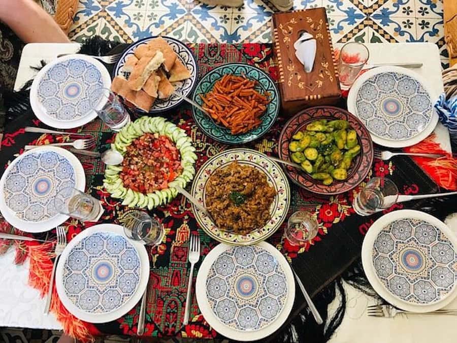 Marrakech: Traditional Moroccan Cooking Class & Market Visit - Eating the meal you helped make