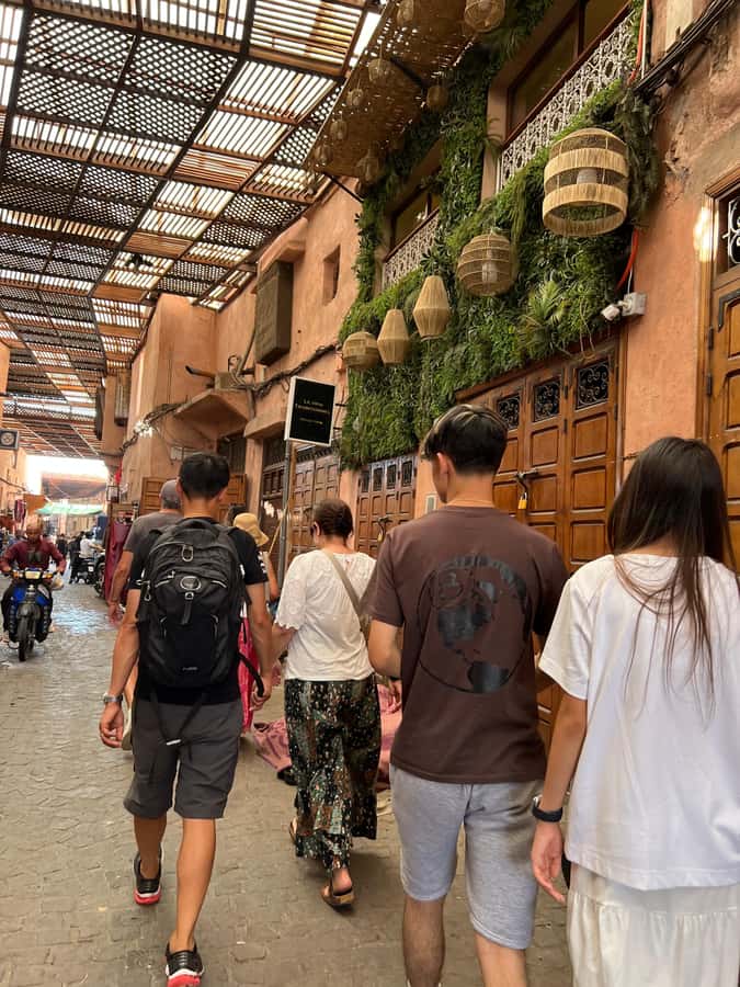 Marrakech: Traditional Moroccan Cooking Class & Market Visit - Entering Khmisa’s traditional riad