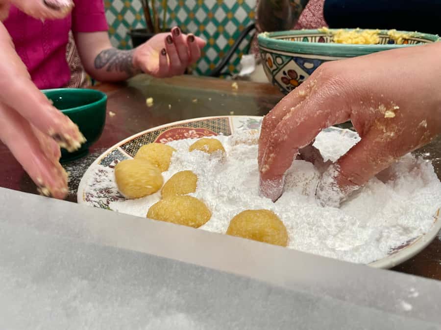Moroccan Crepes & Pastries Kitchen - Kneading dough with local women
