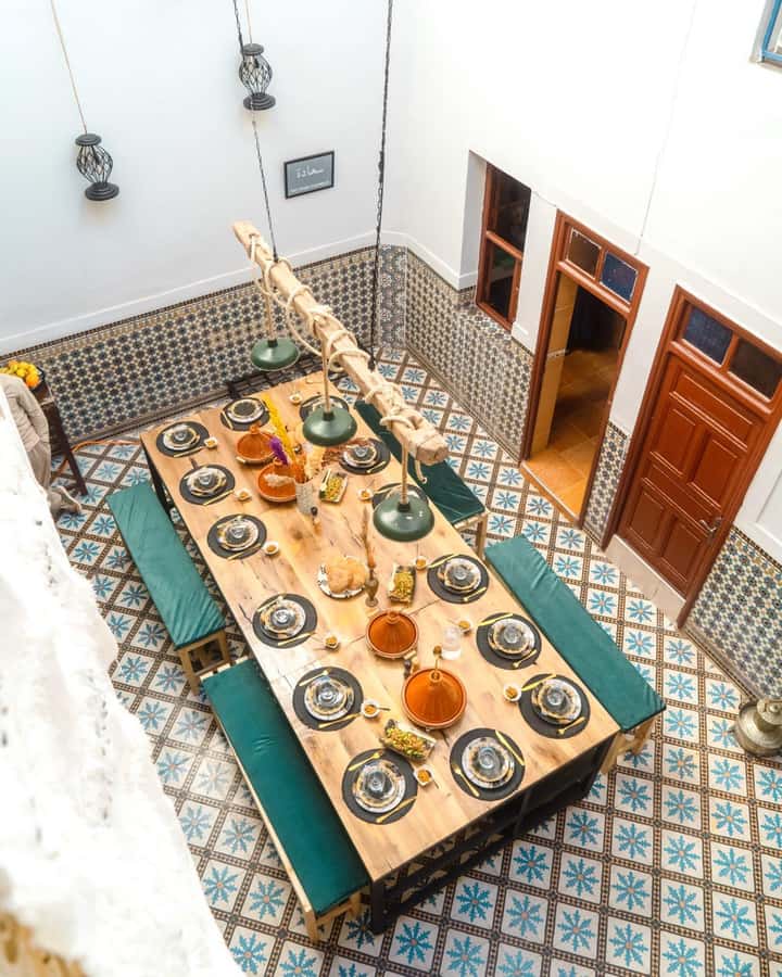 Moroccan Food Cooking Class with a Local Chef in Marrakech - Cutting, seasoning, and building the tagine
