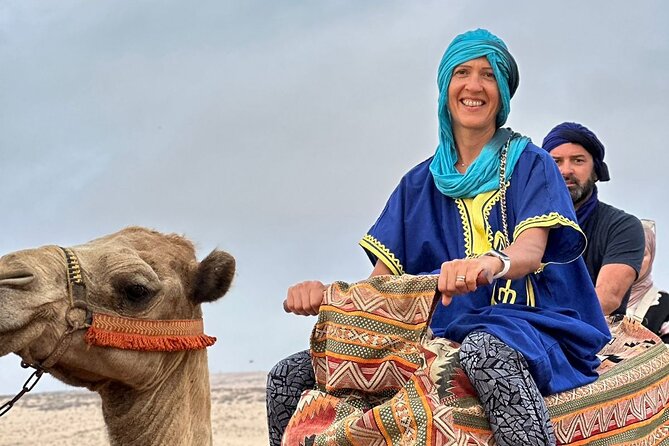 Sunset Camel Ride tour with Barbecue dinner in the beach - Choosing your camel at the ranch