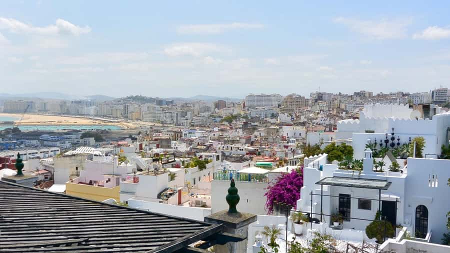 Tangier: Full-Day Private Sightseeing Tour with Camel Ride - Riding a camel on Achakar Beach